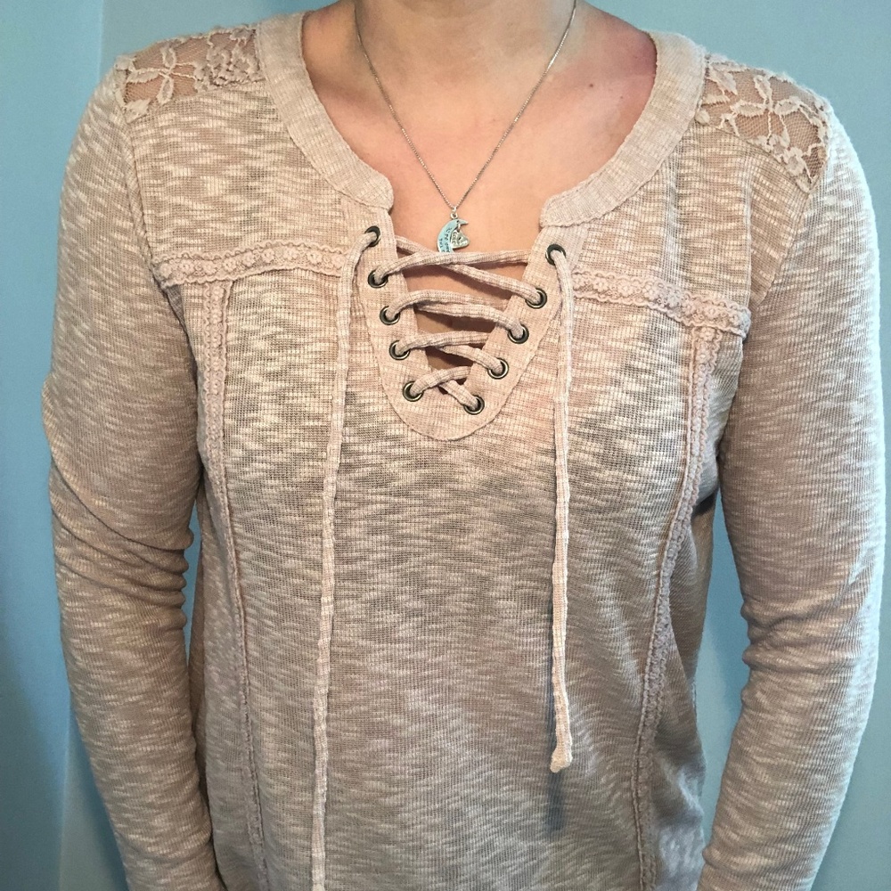 pink sweater with lace backing